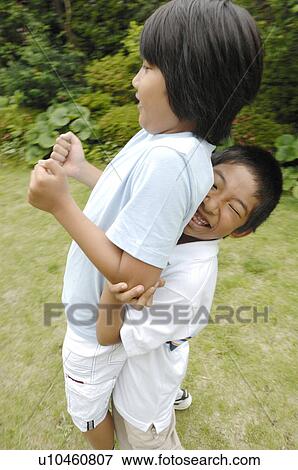 Stock Photo - Brother with good relations. Fotosearch