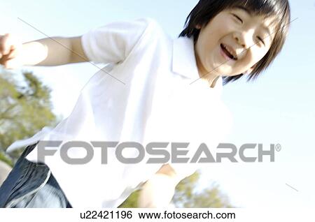 Stock Photograph - Child who seems delightful. Fotosearch