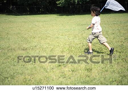 Child who takes away an insect View Large Photo Image Stock Image - Child who takes away an insect. Fotosearch