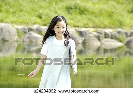Girl in the park View Large Photo Image Stock Image - Girl in the park. Fotosearch