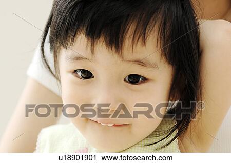 Stock Image - Portrait of girl. Fotosearch