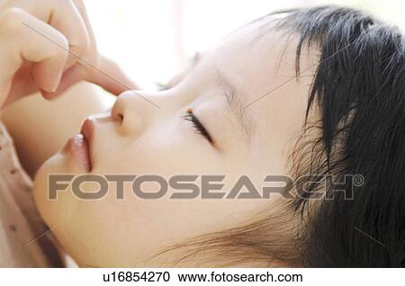 Sleeping face of girl View Large Photo Image Stock Image - Sleeping face of girl. Fotosearch