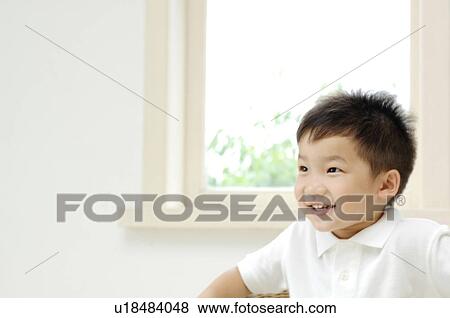 Stock Photo - Smiling boy. Fotosearch