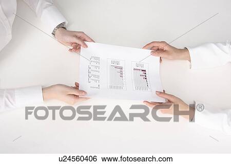 Hand of a woman handing a document View Large Photo Image Stock Photograph - Hand of a woman handing a document. Fotosearch