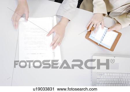 Stock Image - Meeting scene. Fotosearch