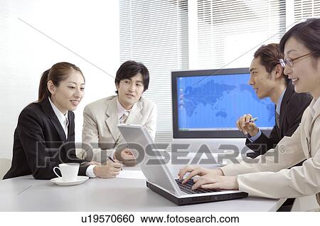 Stock Image - Office workers during conference. Fotosearch