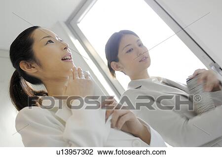 Woman who waits for the elevator View Large Photo Image Stock Image - Woman who waits for the elevator. Fotosearch