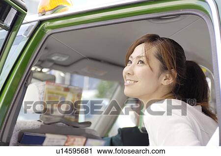 Taxi and woman View Large Photo Image Stock Image - Taxi and woman. Fotosearch