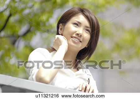 Stock Photograph - Verdure and woman. Fotosearch