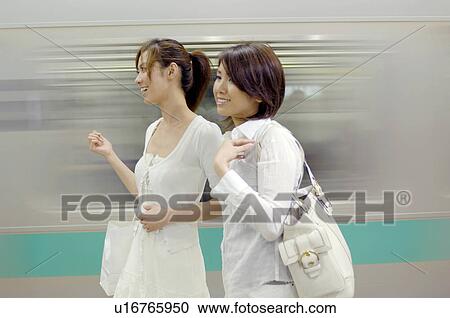 Woman at the platform View Large Photo Image Stock Image - Woman at the platform. Fotosearch
