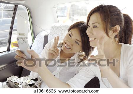 Women in the taxi View Large Photo Image Stock Photography - Women in the taxi. Fotosearch