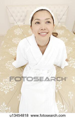 Stock Photo - Woman after taking a bath. Fotosearch