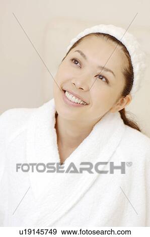 Woman after taking a bath View Large Photo Image Stock Photo - Woman after taking a bath. Fotosearch