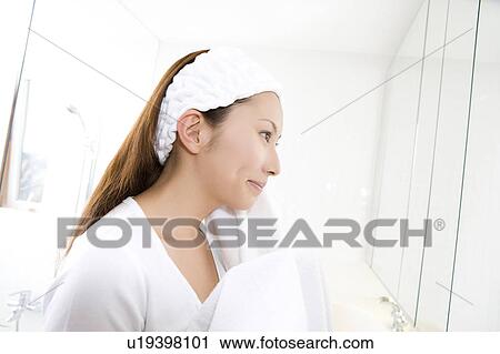Woman in the powder room View Large Photo Image Stock Image - Woman in the powder room. Fotosearch
