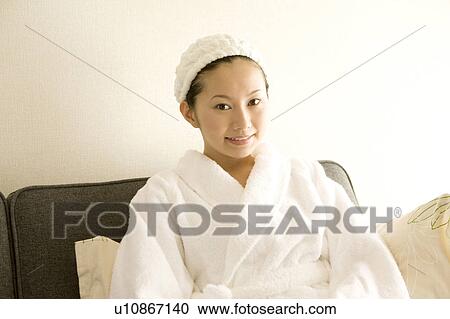 Woman wearing a bathrobe View Large Photo Image Stock Image - Woman wearing a bathrobe. Fotosearch
