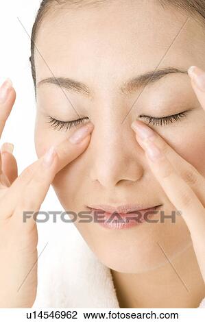Stock Image - Woman who does skin care. Fotosearch