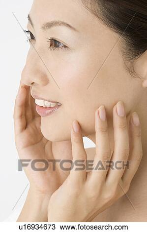 Woman who does skin care View Large Photo Image Stock Image - Woman who does skin care. Fotosearch