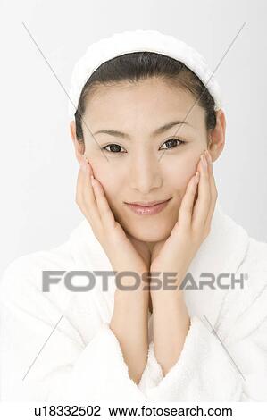 Woman who does skin care View Large Photo Image Stock Image - Woman who does skin care. Fotosearch