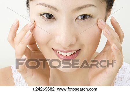 Stock Image - Woman who does skin care. Fotosearch