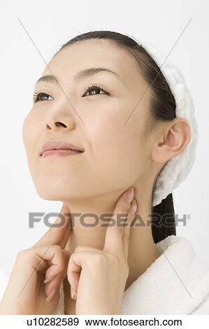 Woman who does skin care View Large Photo Image Stock Photo - Woman who does skin care. Fotosearch