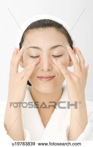 Woman who does skin care View Large Photo Image Stock Photo - Woman who does skin care. Fotosearch