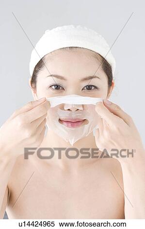 Stock Photography - Woman who does skin care. Fotosearch