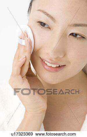 Stock Photo - Woman who makes up. Fotosearch