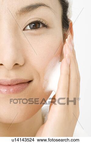 Woman who washes her face View Large Photo Image Picture - Woman who washes her face. Fotosearch