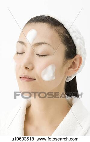 Woman who washes her face View Large Photo Image Stock Photo - Woman who washes her face. Fotosearch