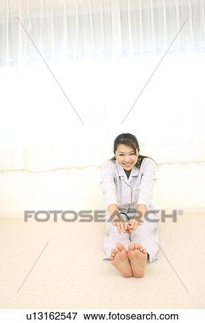 Woman who does stretch View Large Photo Image Stock Photo - Woman who does stretch. Fotosearch