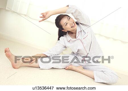 Woman who does stretch View Large Photo Image Stock Photo - Woman who does stretch. Fotosearch