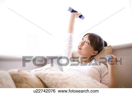 Woman who has gymnastic exercise in morning View Large Photo Image Stock Photograph - Woman who has gymnastic exercise in morning. Fotosearch