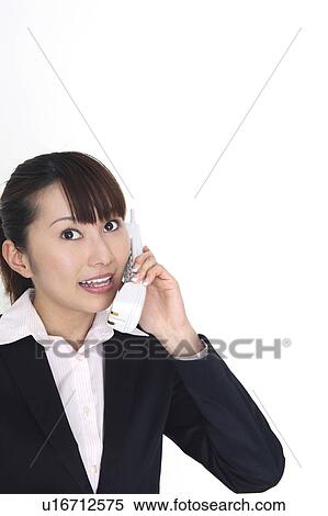 Business lady receaving a call View Large Photo Image Stock Photography - Business lady receaving a call. Fotosearch
