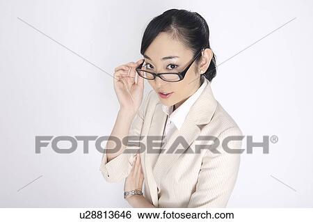 Business lady wearing glasses View Large Photo Image Stock Photograph - Business lady wearing glasses. Fotosearch
