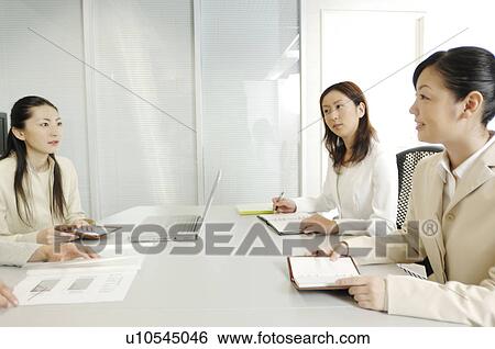 Stock Photograph - Meeting scene. Fotosearch