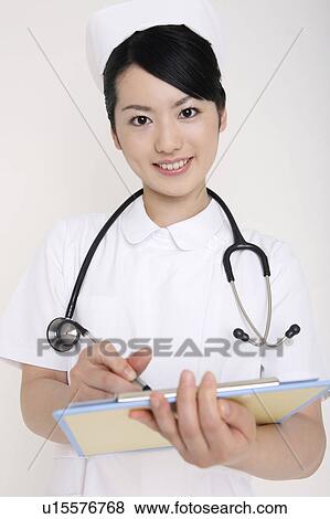 Stock Photo - Portrait of nurse. Fotosearch