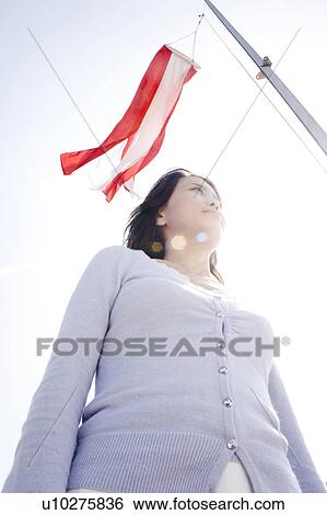 Sky and woman View Large Photo Image Stock Photograph - Sky and woman. Fotosearch