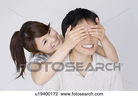 Blindfolding sweetheart View Large Photo Image Stock Image - Blindfolding sweetheart. Fotosearch