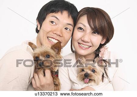 Couple and dogs View Large Photo Image Stock Image - Couple and dogs. Fotosearch
