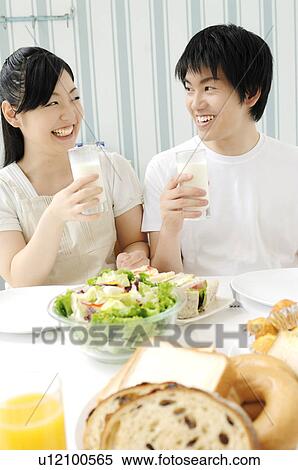 Couple eating meal View Large Photo Image Stock Photography - Couple eating meal. Fotosearch