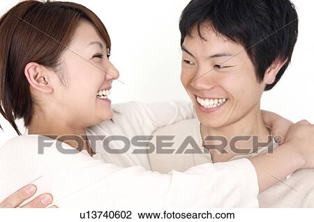 Couple enbracing each other View Large Photo Image Stock Image - Couple enbracing each other. Fotosearch
