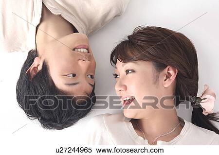 Couple gazing each other View Large Photo Image Stock Photography - Couple gazing each other. Fotosearch