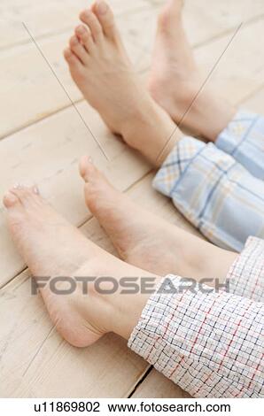 Legs of couple View Large Photo Image Stock Image - Legs of couple. Fotosearch