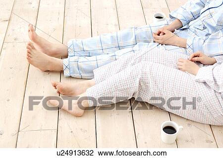 Legs of couple View Large Photo Image Stock Image - Legs of couple. Fotosearch