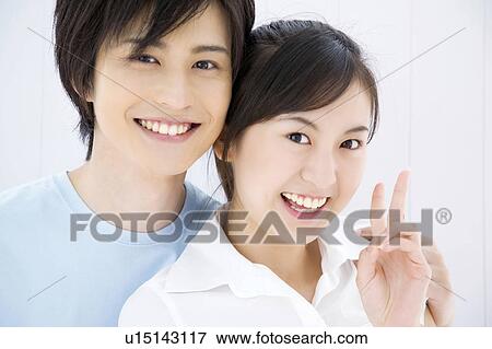 Portrait of young couple View Large Photo Image Stock Photo - Portrait of young couple. Fotosearch
