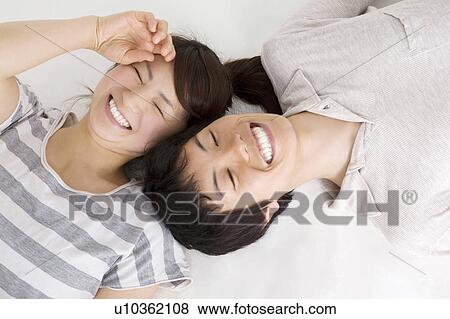 Stock Photo - Sweetheart who lies down. Fotosearch