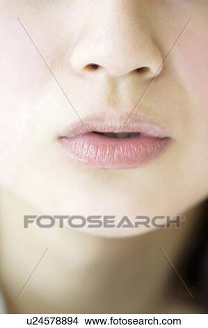 Picture - Lip of woman. Fotosearch