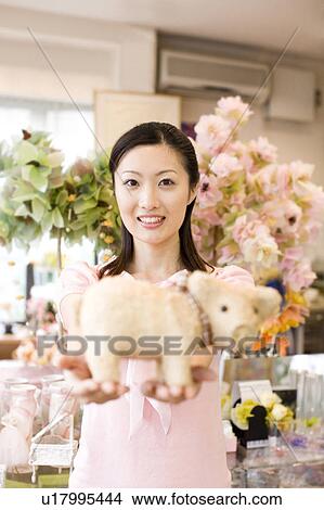 Woman at the flower shop View Large Photo Image Picture - Woman at the flower shop. Fotosearch