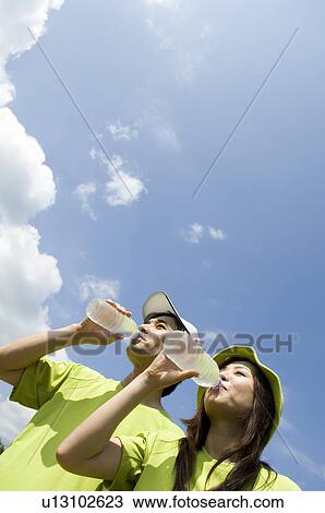 Husband and wife drinking water View Large Photo Image Stock Image - Husband and wife drinking water. Fotosearch