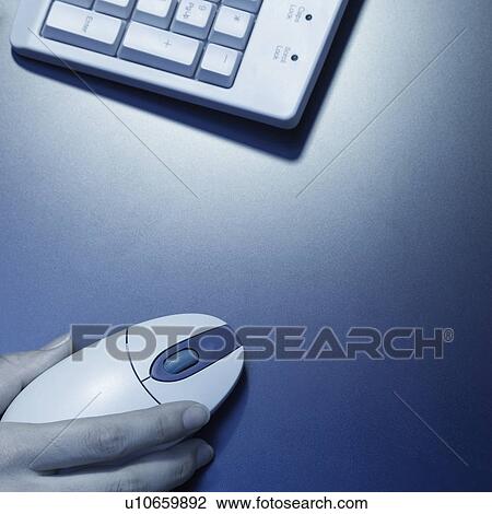A man using computer mouse View Large Photo Image Stock Image - A man using computer mouse. Fotosearch